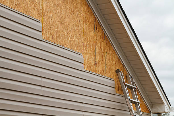 Professional Siding technician working in Waterford, PA
